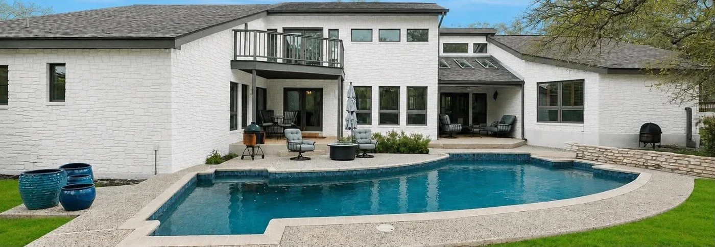 The same poolside exterior after painting, seen from a different viewpoint.